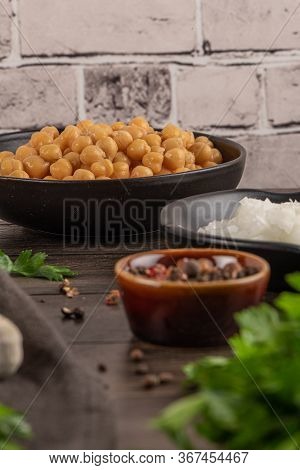 Cooked Hickpeas In A Bowl On Kitchen Countertop.