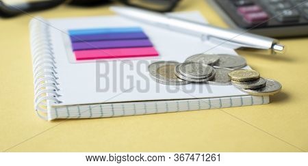 White Calendar With Taiwan Coin In Planning Travel Concept.