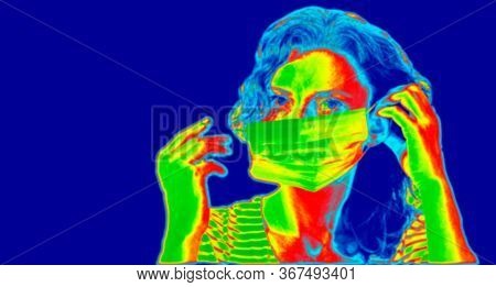 thermal camera picture detecting infected people with Covid-19. Coronavirus spread control concept.