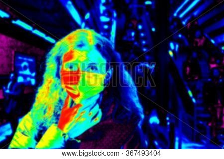 thermal camera picture detecting infected people with Covid-19. Coronavirus spread control concept.
