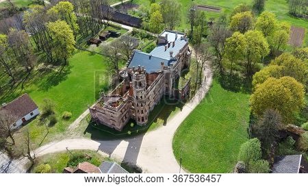 Aerial Photo Of Destroyed Odzienas Castle In Latvia, Europe On A Beautiful Sunny Springday, Concept 