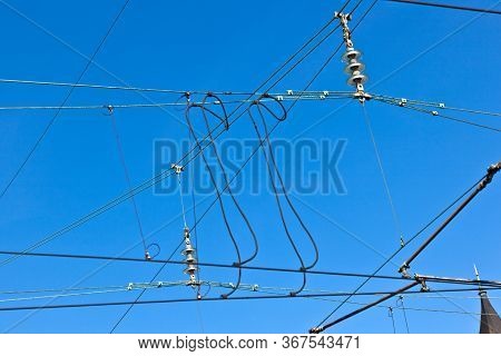 Catenary Of Train Under Blue Sky