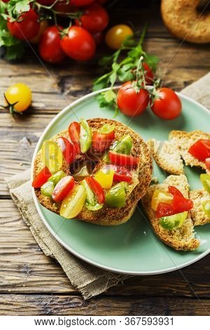 Traditional Italian Bread Frisella With Tomatos