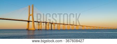 Suspension Vasco Da Gama Bridge Over The Tagus River In Lisbon, Portugal.