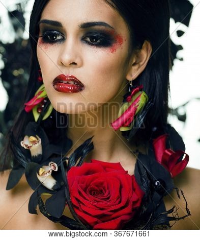 Pretty Brunette Woman With Rose Jewelry, Black And Red, Bright Make Up Kike A Vampire Closeup Red Li