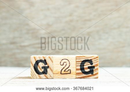 Alphabet Letter In Word G2g (abbreviation Of Government To Government) On Wood Background