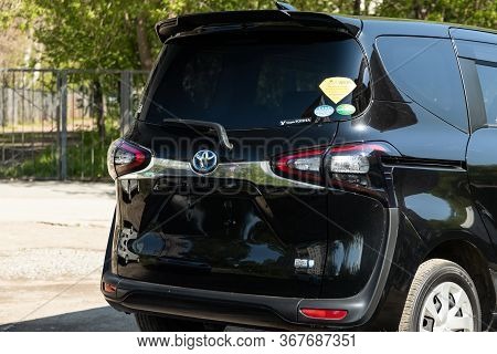 Novosibirsk/ Russia - May 03 2020:   Black Toyota Sienta,  Back View.  Modern  Minivan Made In Japan