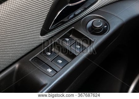 Novosibirsk/ Russia - May 03 2020:  Chevrolet Cruze, Close-up Of The Side Door Buttons: Window Adjus