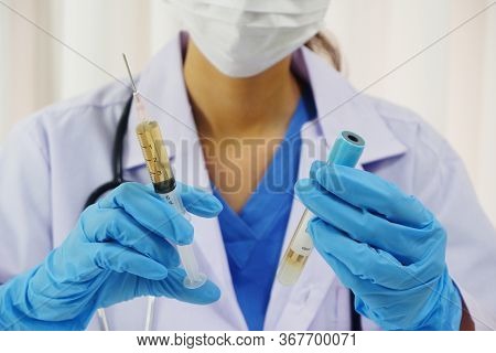 Female Doctor Working In Laboratory For Testing On Vaccine For Pandermic Covid19