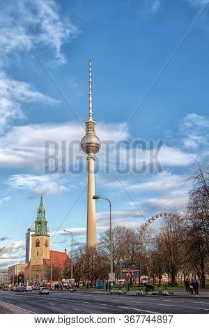 Berlin, Germany - December 9, 2019: Belltower Of St. Mary's Church Or Marienkirche. Tv Tower Near Th