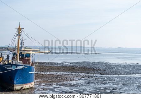 Coastline In Zeeuwse Village Yerseke With Famous Oysters Wells During Low Tide, Zeeland, Netherlands