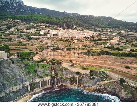 Picturesque Cove Mediterranean Sea Bay Lagoon View Hillside Houses In Small Spanish European Village