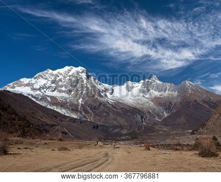 View Of Manaslu Mount In Manaslu Conservation Area In The Nepal Himalaya. Manaslu Is The Eighth-high
