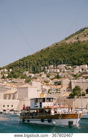 Dubrovnik, Croatia - 04 May 2016: The Old Port Harbor Is Porporela, Near The Walls Of The Old Town O