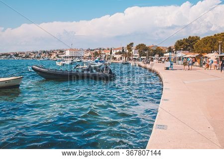 Novalja, Pag Island, Croatia - July 22 2018: Picturesque Promenade Of Novalja Town. The Place Is Pop