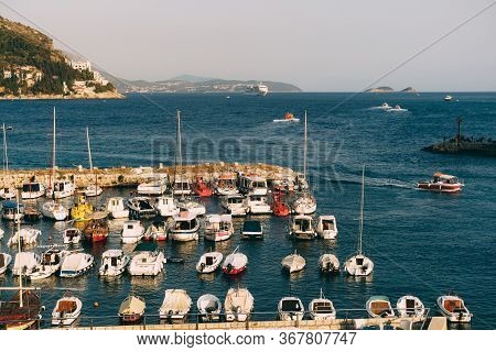 The Old Port Harbor Is Porporela, Near The Walls Of The Old Town Of Dubrovnik, Croatia. Moored Boats