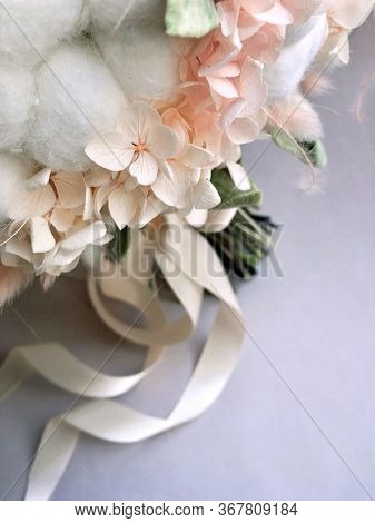 Flower Arrangement Cotton Blooms In White, Roses In A Beautiful Blend Of Peach, Light Peach And Whit