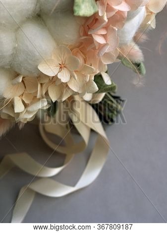Flower Arrangement Cotton Blooms In White, Roses In A Beautiful Blend Of Peach, Light Peach And Whit