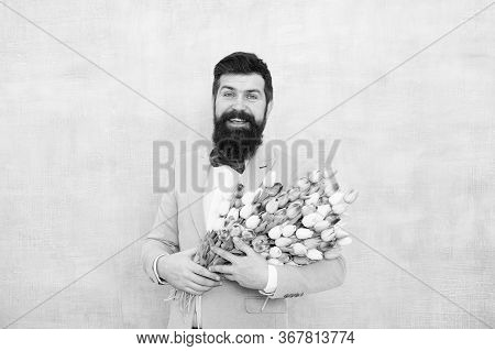 Ideas To Celebrate Without Breaking Bank. Spring Mood. Love Date. Gift Bouquet. Bearded Man Hipster 