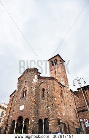 Milan. Italy - May 20, 2019: Church of San Sepolcro in Milan (Chiesa di San Sepolcro). Facade with Entrance Inside.