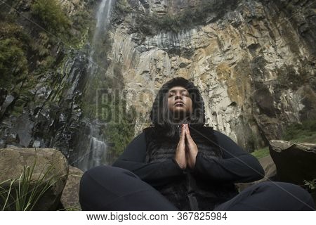 Urubici, Santa Catarina, Brazil: Afro Brazilian Woman Meditates Amid The Forest With The Avencal Wat