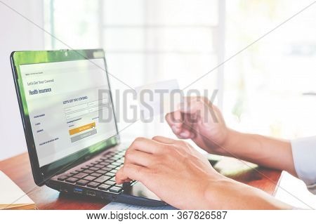 Concept Online Payment With Cradit Card. Hand Of Men Using Laptop For To Payment Make Online Health 