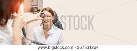 Ophthalmologist Doctor In Exam Optician Laboratory With Female Patient. Eye Care Medical Diagnostic.
