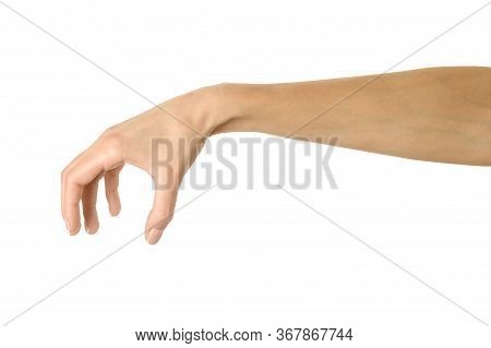 Hand Picking, Holding, Grabbing Or Reaching. Woman Hand With French Manicure Gesturing Isolated On W