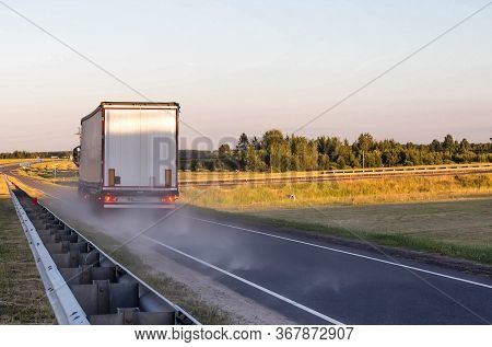 Emergency Braking Of A Loaded Truck On Dry Asphalt. Safety Concept And Stopping Distance With Abs, C