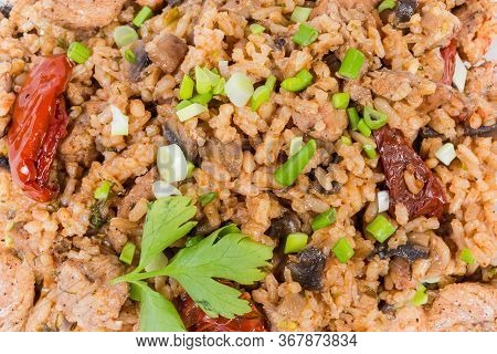 Cooked Paella With Meat And Mushroms, Fragment Top View Close-up, Background
