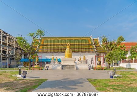 Wat Rakhang Khositaram, A Buddhist Temple Stupa At Noon With Blue Sky In Bangkok City, Thailand. Tha