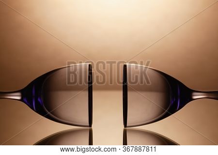 Empty Wine Glasses On A Clean Gradient Background. Empty Drinking Transparent Wine Glasses