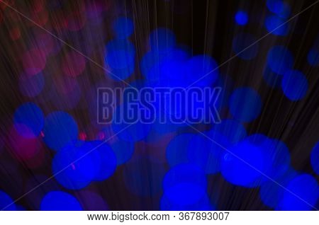 Blurred Abstract Pink And Blue Bokeh Lights. Christmas Holiday Defocused Background. Backdrop For Yo
