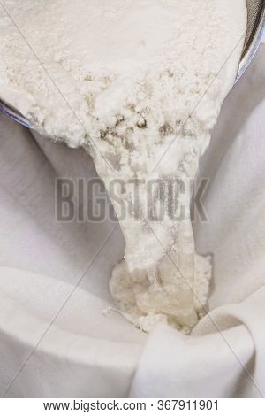 Fresh Cheese Making Process, Clotted Cheese Throw A Cotton Cloth, Closeup, Homemade Cottage Cheese O