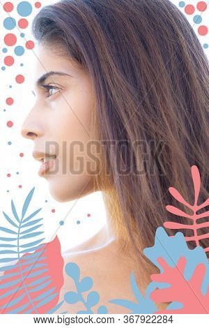 Close up profile portrait of an attractive, woman with long hair and