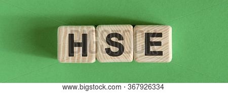 Hse - Text On Wooden Cubes With Green Background
