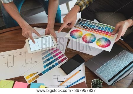 Creative Team Meeting To Discuss The Terms Of Use Of Original Product Colors For Product Design In C