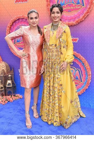 LOS ANGELES - MAR 07:  Leela Ladnier and Freida Pinto arrives for âMira, Royal Detectiveâ World Premiere on March 07, 2020 in Burbank, CA