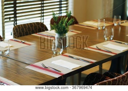 Casual Restaurant Dining Table Set Up, With Dark Brown Color Theam