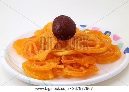 Indian Sweet Or Dessert Jalebi With Kala Gulab Jamun
