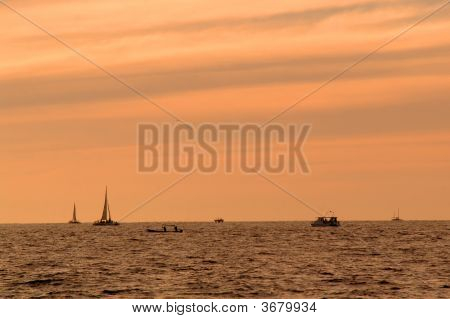 Boats On Horizon At Sundown - Los Cabos, Mexico