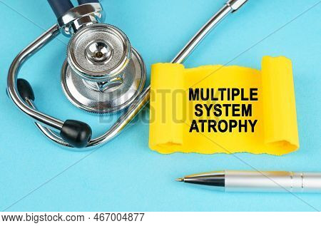 Medical Concept. On The Blue Surface There Is A Stethoscope, A Pen And A Yellow Sticker With The Ins
