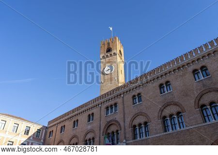 Watch Tower In The City Center Of Treviso, Italy. Beautiful Piazza Dei Signori Is The Palazzo Dei Tr