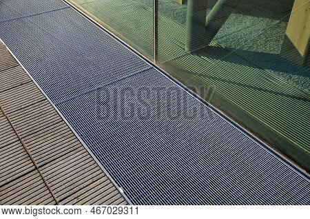 Ventilation Grille Along The House. Basement Windows Are Below Ground Level. Metal Walking Grid. Fou