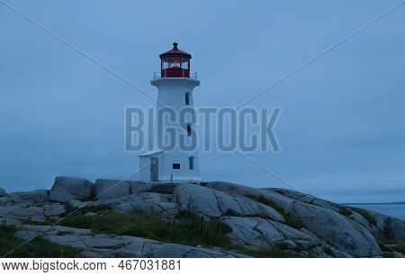 Peggys Cove Lighthouse At Sunset, Canada. High Quality Photo
