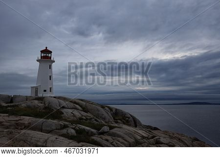 Peggys Cove Lighthouse At Sunset, Canada. High Quality Photo