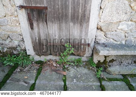 Farmhouse With Lots Of Wood And Stone In Detail