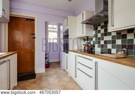 Newmarket, Suffolk, England - May 29 2018: Compact Modern Refitted Kitchen Within Older House With B