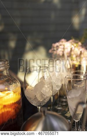 Glasses Of Cocktails On The Bar. Glasses Of Sparkling Wine With Red Alcohol. Preraring Aperol Spritz