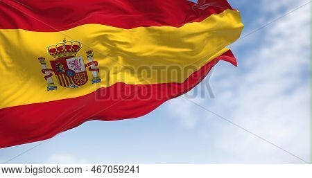 Spain National Flag Waving On A Clear Day. Kingdom Of Spain Is A Country Located In Southwestern Eur